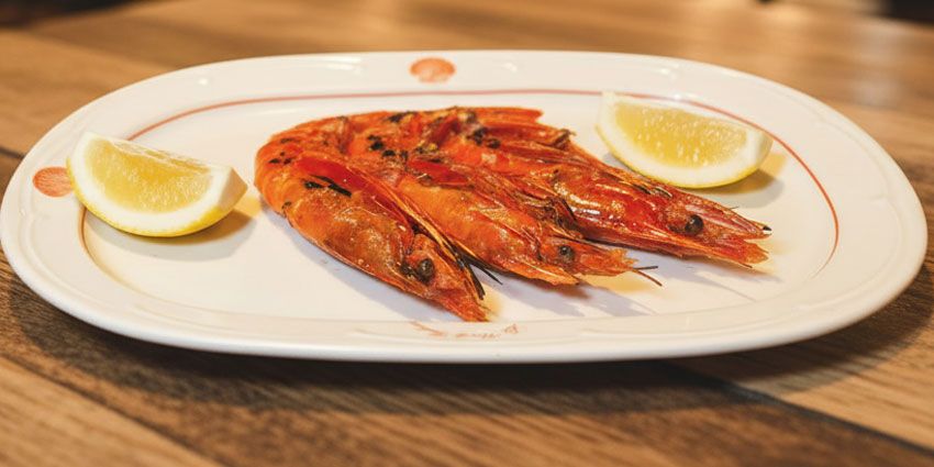 Dónde disfrutar carabineros a la plancha en Madrid centro, especialidad de marisco gallego en Flor de Galicia