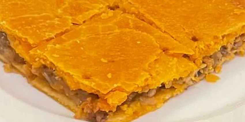 Empanada gallega de zamburiñas en Madrid · Flor de Galicia